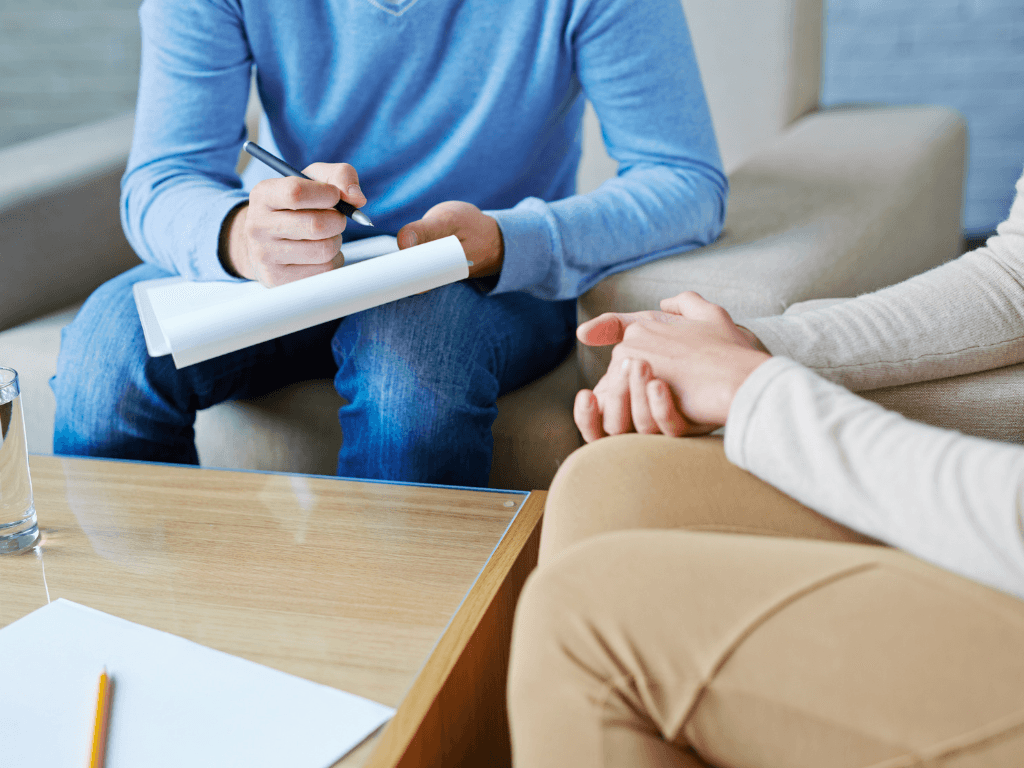 Two people in a counseling conversation